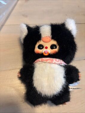 Black & White Plush Baby Doll with Pink Pacifier and Scarf
